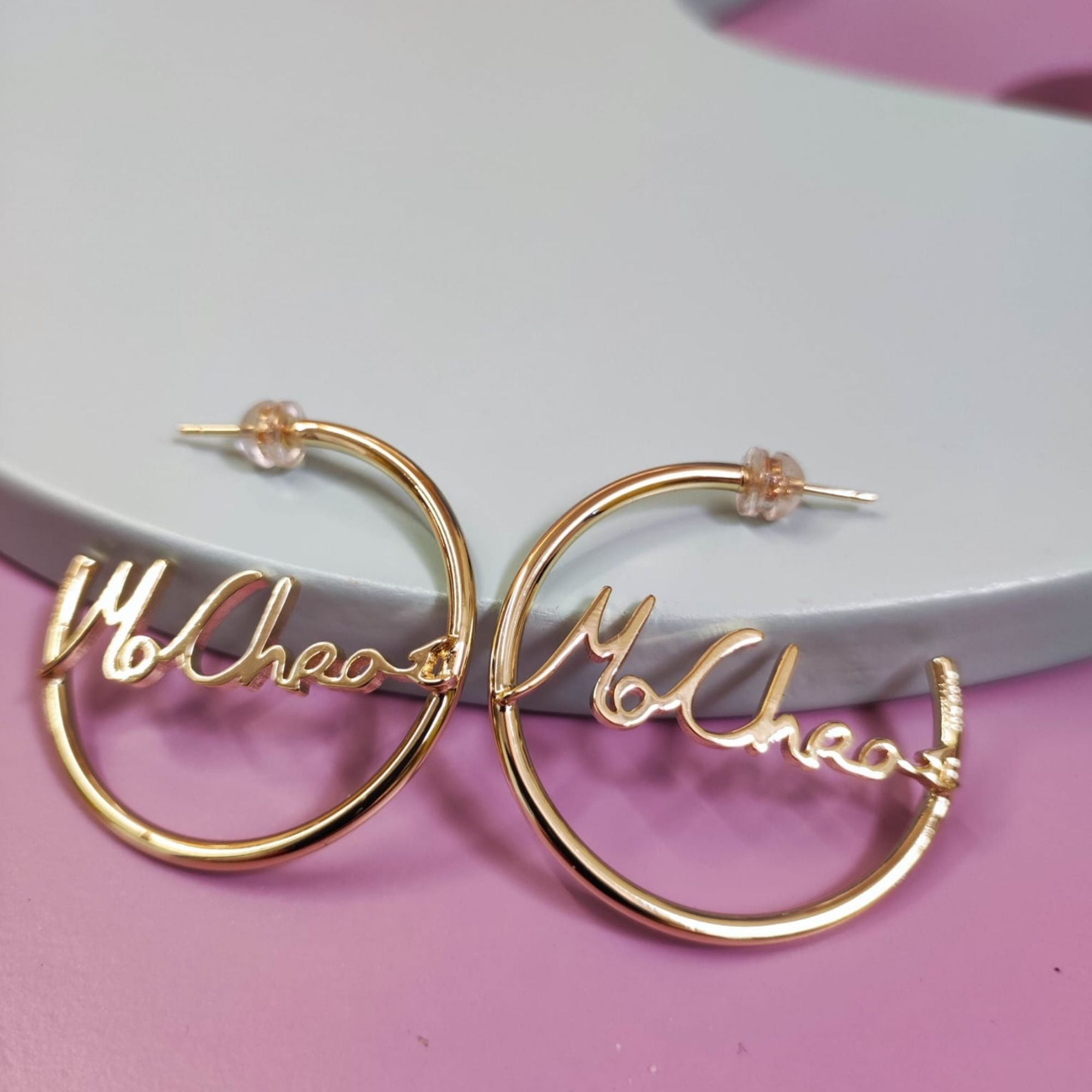 Gold Mo Chroí Hoop Earrings on Display