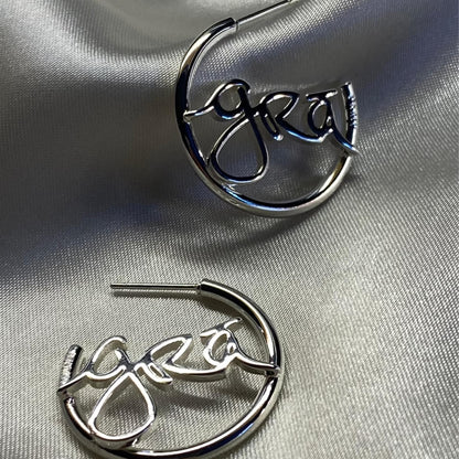 Silver Grá Beag Hoop Earrings on Grey Silk